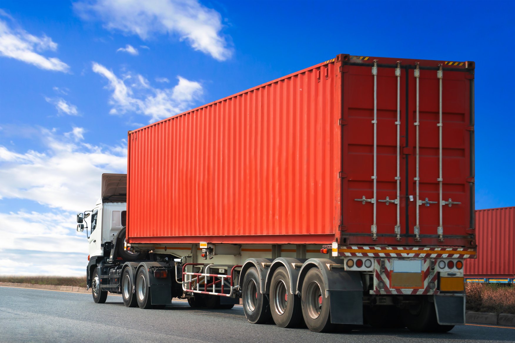 Semi Trailer Truck Driving on The Road. Shipping Cargo Container, Commercial Truck Transport. Delivery Express. Diesel Trucks. Lorry Tractor. Freight Truck Logistic.